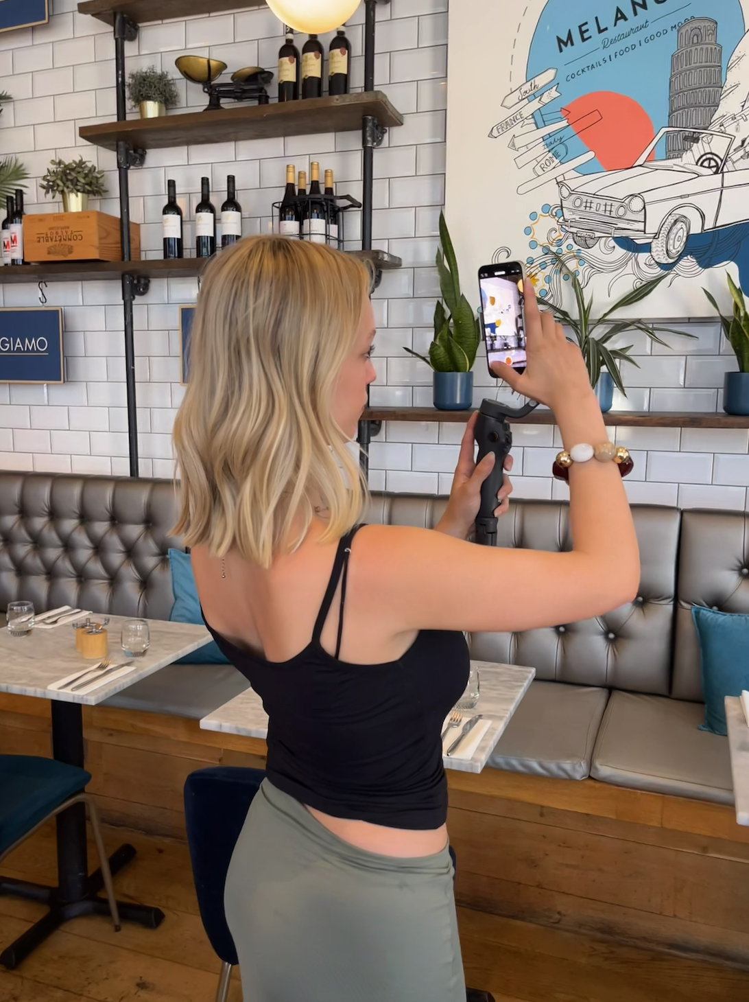 Content creator filming in a restaurant